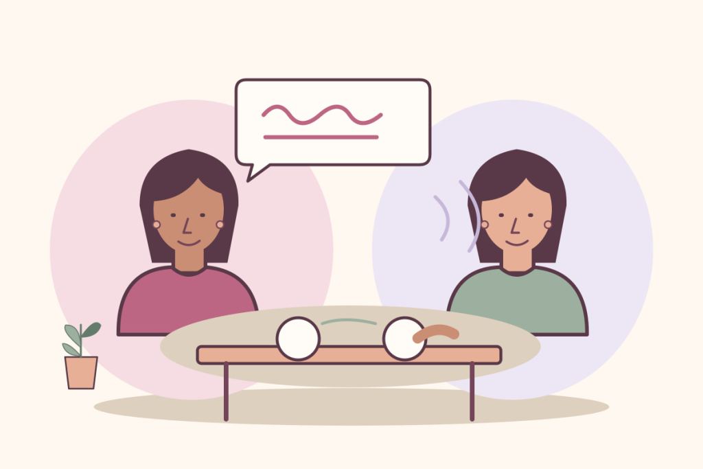 Dos mujeres se miran mientras una habla y la otra escucha, con un espacio de conversación entre ambas.